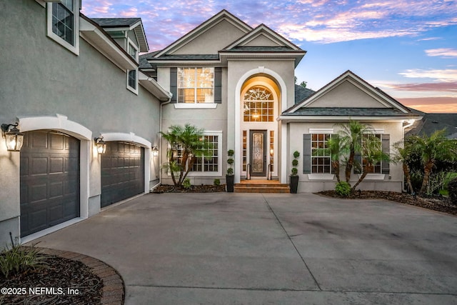 105 Calle Norte, Saint Augustine, FL 32095 - traditional home with stucco siding, driveway, and an attached garage