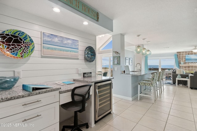 2122 S Fletcher Ave, Fernandina Beach, FL 32034 - home office featuring wine cooler, recessed lighting, baseboards, and light tile patterned flooring