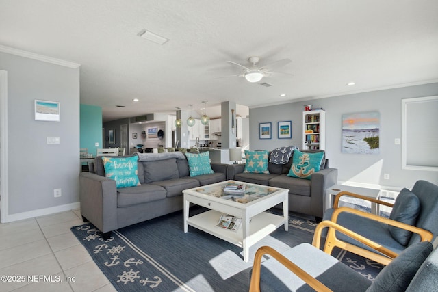 2122 S Fletcher Ave, Fernandina Beach, FL 32034 - living room with light tile patterned flooring, recessed lighting, ceiling fan, crown molding, and baseboards