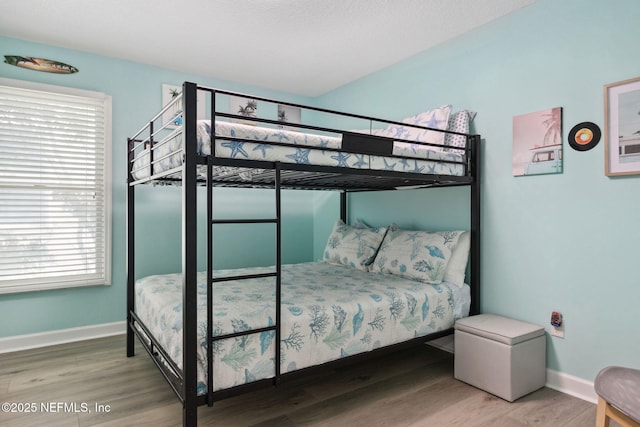 2122 S Fletcher Ave, Fernandina Beach, FL 32034 - bedroom with baseboards and wood finished floors