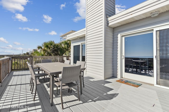 2122 S Fletcher Ave, Fernandina Beach, FL 32034 - wooden terrace with outdoor dining area
