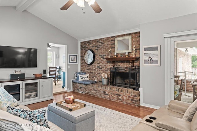 2632 Loopridge Dr, Orange Park, FL 32065 - living area with ceiling fan, wood finished floors, and a fireplace