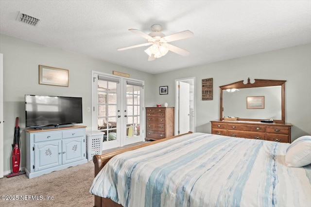2632 Loopridge Dr, Orange Park, FL 32065 - bedroom with french doors, access to outside, light carpet, and a ceiling fan