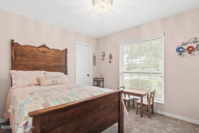 2632 Loopridge Dr, Orange Park, FL 32065 - bedroom featuring light carpet, baseboards, and a textured ceiling