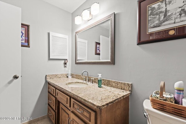 2632 Loopridge Dr, Orange Park, FL 32065 - bathroom featuring vanity and toilet