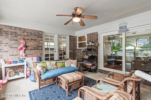 2632 Loopridge Dr, Orange Park, FL 32065 - sunroom featuring brick wall, ceiling fan, and outdoor lounge area