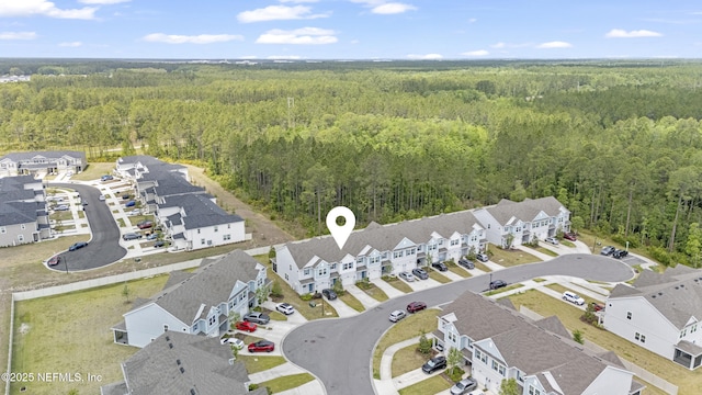 10350 Alder Creek Ln, Jacksonville, FL 32222 - aerial perspective of suburban area with a heavily wooded area