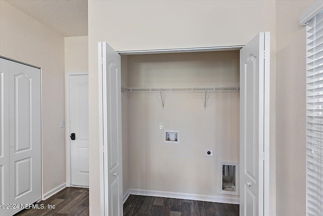clothes washing area with hookup for a washing machine, dark wood finished floors, visible vents, hookup for an electric dryer, and laundry area