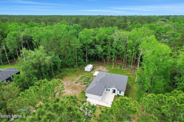 aerial view with a forest view