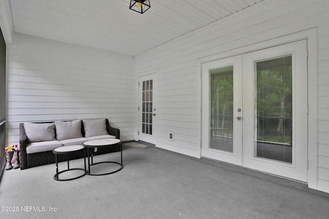 sunroom / solarium with french doors