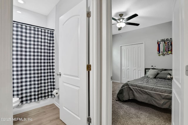 bedroom featuring a closet and a ceiling fan