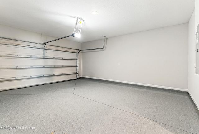 437 Narrowleaf Dr, Saint Johns, FL 32259 - garage with baseboards and a garage door opener