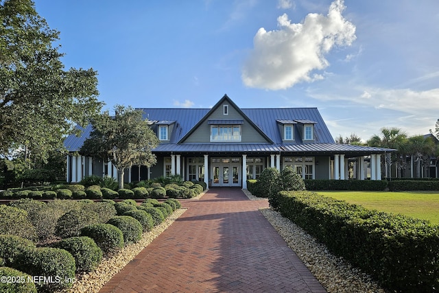 437 Narrowleaf Dr, Saint Johns, FL 32259 - view of front facade with french doors, a standing seam roof, and metal roof
