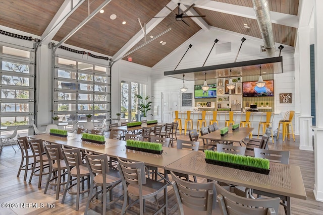 437 Narrowleaf Dr, Saint Johns, FL 32259 - dining space with high vaulted ceiling, wood finished floors, a ceiling fan, wooden ceiling, and beam ceiling