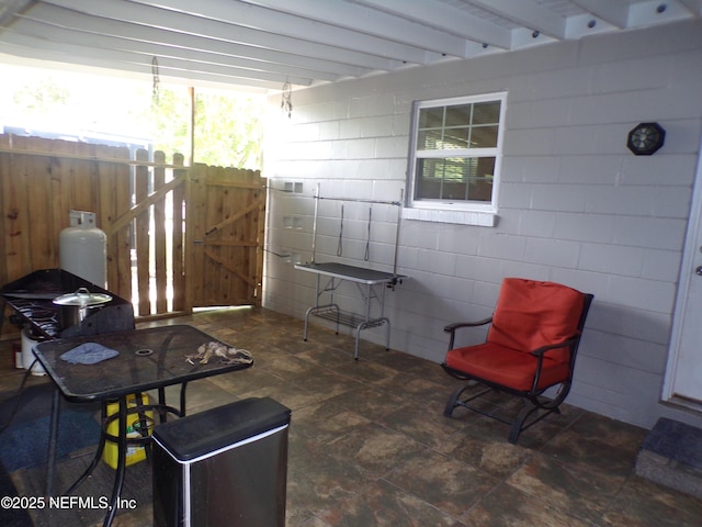 view of patio / terrace featuring fence