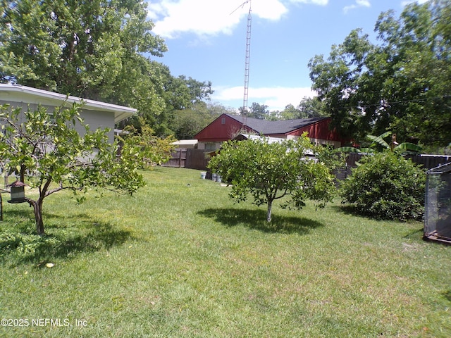 view of yard with fence