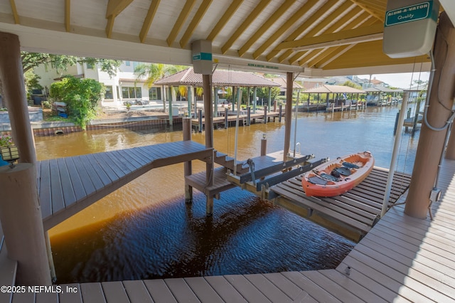 dock area featuring a water view and boat lift