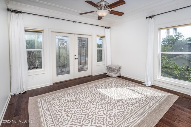 interior space featuring ornamental molding, french doors, a ceiling fan, and wood finished floors