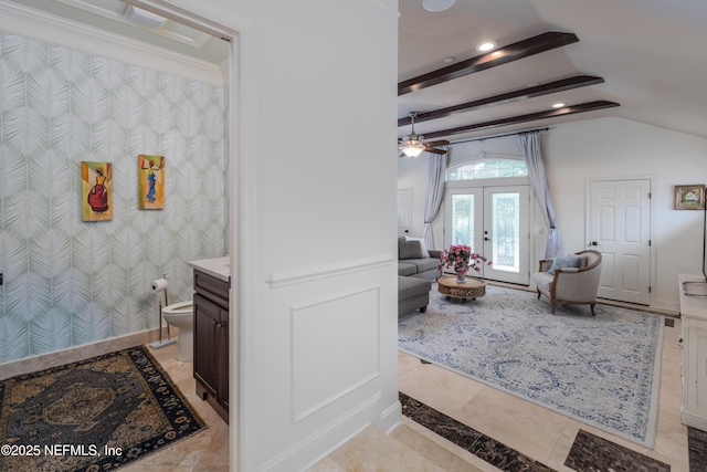 bathroom with toilet, a ceiling fan, vanity, lofted ceiling, and recessed lighting