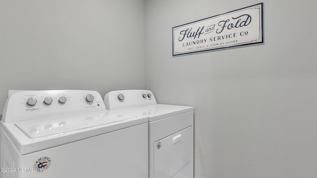 washroom with laundry area and separate washer and dryer