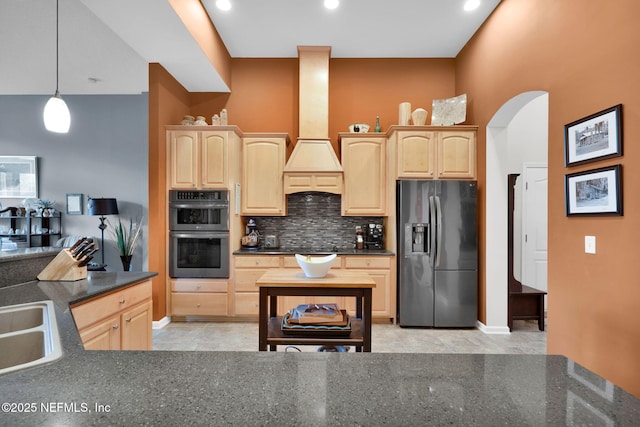 809 Ifield Rd, Saint Augustine, FL 32095 - kitchen featuring black fridge with ice dispenser, light brown cabinetry, stainless steel double oven, and recessed lighting