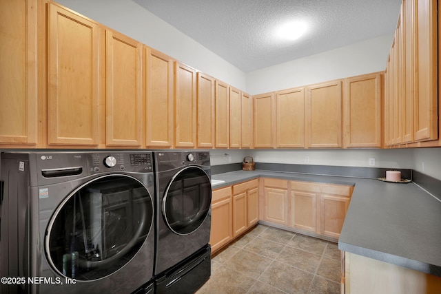 809 Ifield Rd, Saint Augustine, FL 32095 - laundry area with washer and dryer, cabinet space, and a textured ceiling