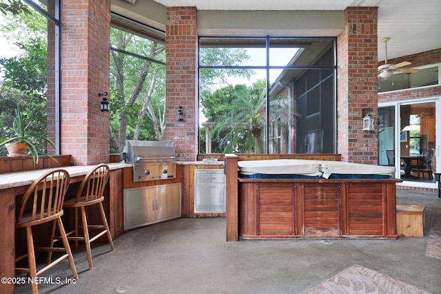 809 Ifield Rd, Saint Augustine, FL 32095 - view of patio / terrace with a grill and exterior kitchen