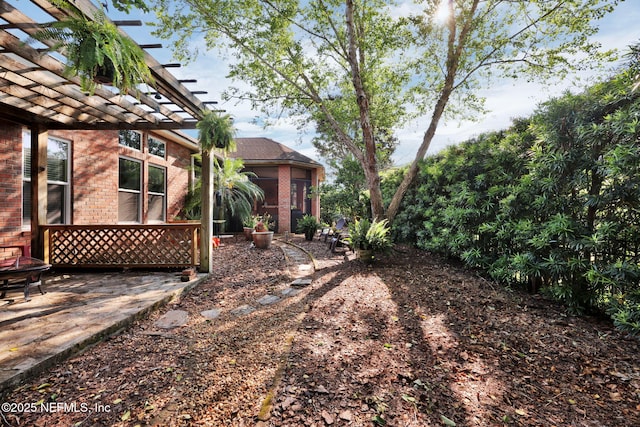 809 Ifield Rd, Saint Augustine, FL 32095 - view of yard featuring a patio area