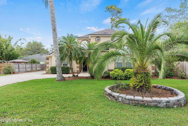 13111 Hammock Cir S, Jacksonville, FL 32225 - mediterranean / spanish-style home featuring stucco siding and concrete driveway