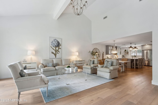 90 Players Club Villas Rd, Ponte Vedra Beach, FL 32082 - living area featuring light wood finished floors, a chandelier, and visible vents