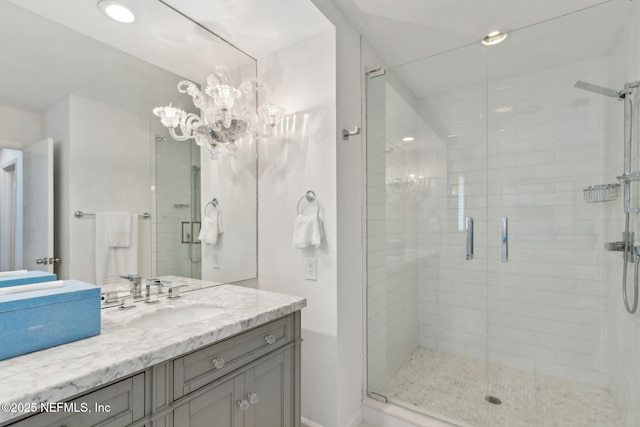 90 Players Club Villas Rd, Ponte Vedra Beach, FL 32082 - bathroom with a stall shower, vanity, and a chandelier