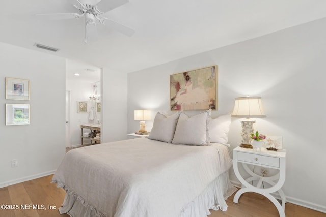 90 Players Club Villas Rd, Ponte Vedra Beach, FL 32082 - bedroom featuring baseboards, ensuite bathroom, light wood-style flooring, and visible vents