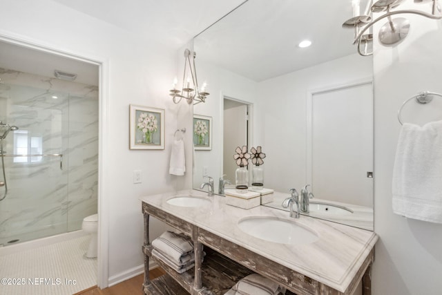90 Players Club Villas Rd, Ponte Vedra Beach, FL 32082 - full bath with a sink, toilet, a marble finish shower, visible vents, and double vanity