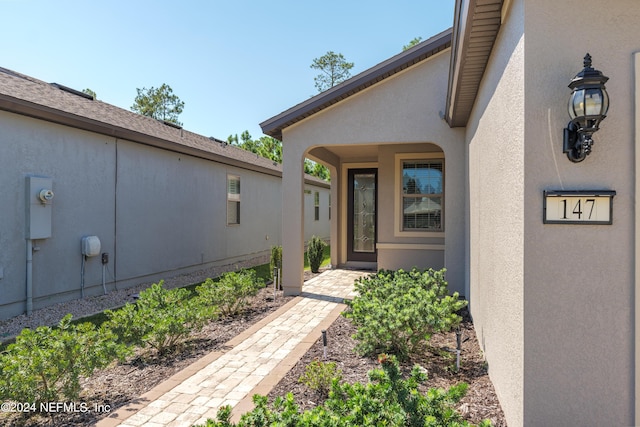 147 Covered Creek Dr, Ponte Vedra, FL 32081 - entrance to property featuring stucco siding