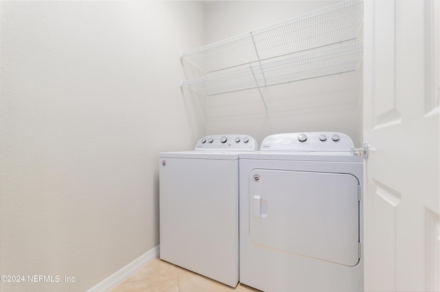 147 Covered Creek Dr, Ponte Vedra, FL 32081 - clothes washing area featuring baseboards, laundry area, light tile patterned flooring, and independent washer and dryer