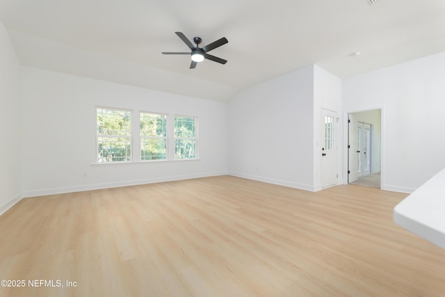 5821 Silver Sands Cir, Keystone Heights, FL 32656 - spare room featuring lofted ceiling, light wood-style flooring, baseboards, and a ceiling fan