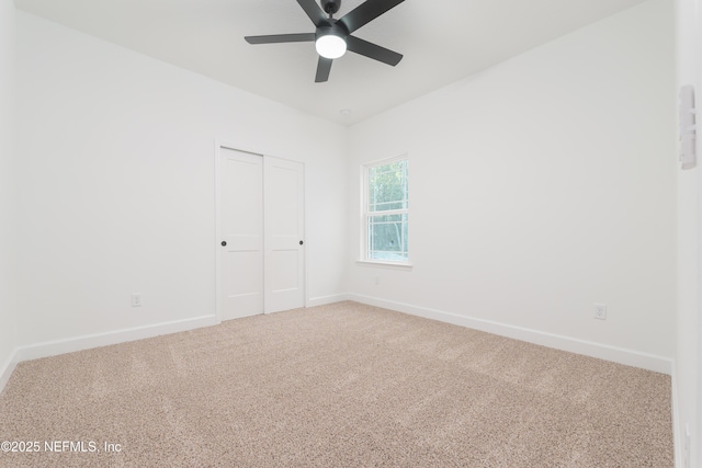 5821 Silver Sands Cir, Keystone Heights, FL 32656 - carpeted spare room with baseboards and a ceiling fan