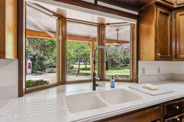 1315 Autumn Trce, Fernandina Beach, FL 32034 - kitchen featuring light countertops and a sink