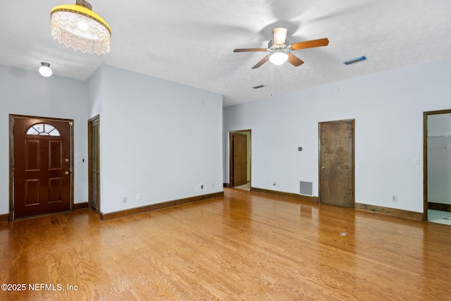 1315 Autumn Trce, Fernandina Beach, FL 32034 - interior space featuring baseboards, ceiling fan, light wood-style floors, and visible vents