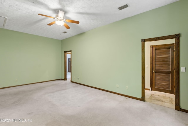 1315 Autumn Trce, Fernandina Beach, FL 32034 - unfurnished bedroom featuring baseboards, carpet flooring, visible vents, and a textured ceiling