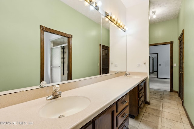 1315 Autumn Trce, Fernandina Beach, FL 32034 - full bath featuring tile patterned flooring, a shower with door, double vanity, and a sink