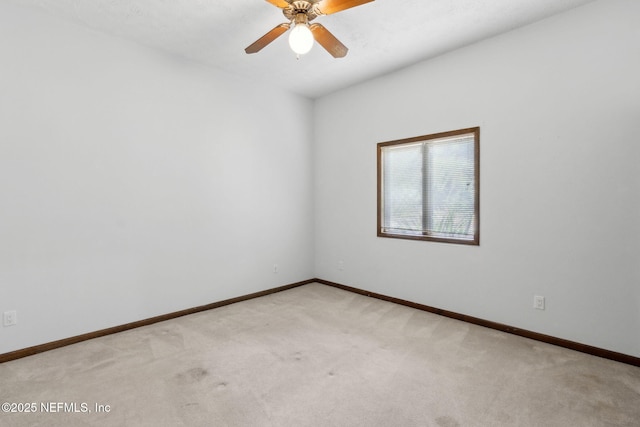 1315 Autumn Trce, Fernandina Beach, FL 32034 - empty room featuring light colored carpet, baseboards, and ceiling fan