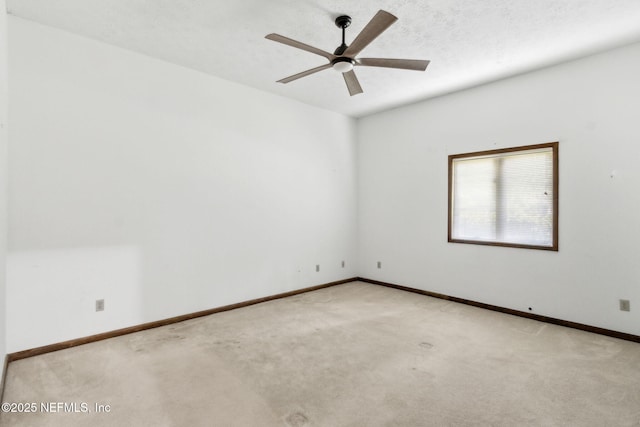 1315 Autumn Trce, Fernandina Beach, FL 32034 - unfurnished room featuring light colored carpet, baseboards, and ceiling fan