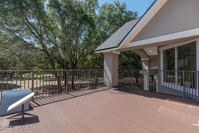 view of patio / terrace with a balcony