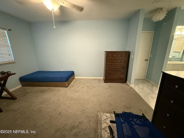 9252 San Jose Blvd Unit 3802, Jacksonville, FL 32257 - bedroom featuring a sink, light carpet, baseboards, and ceiling fan