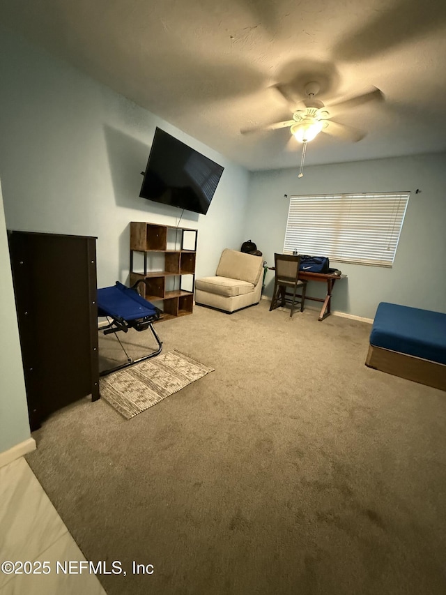 9252 San Jose Blvd Unit 3802, Jacksonville, FL 32257 - carpeted living room featuring ceiling fan and baseboards