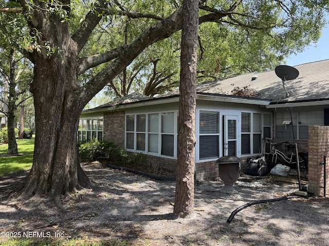 9252 San Jose Blvd Unit 3802, Jacksonville, FL 32257 - rear view of house featuring brick siding