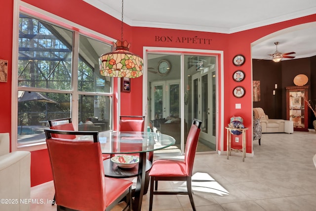 112 Long Branch Way, Saint Augustine, FL 32086 - tiled dining area featuring ceiling fan, ornamental molding, arched walkways, and baseboards