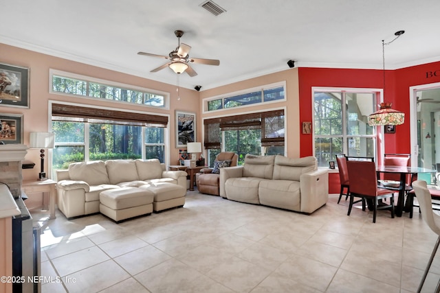 112 Long Branch Way, Saint Augustine, FL 32086 - living area featuring crown molding, visible vents, light tile patterned flooring, and ceiling fan