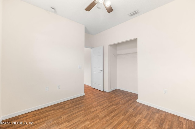 109 N Peachtree St, Hastings, FL 32145 - unfurnished bedroom with light wood finished floors, baseboards, a closet, and ceiling fan